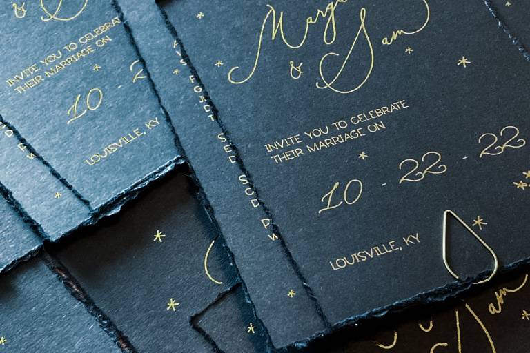 Navy and gold foil text invite
