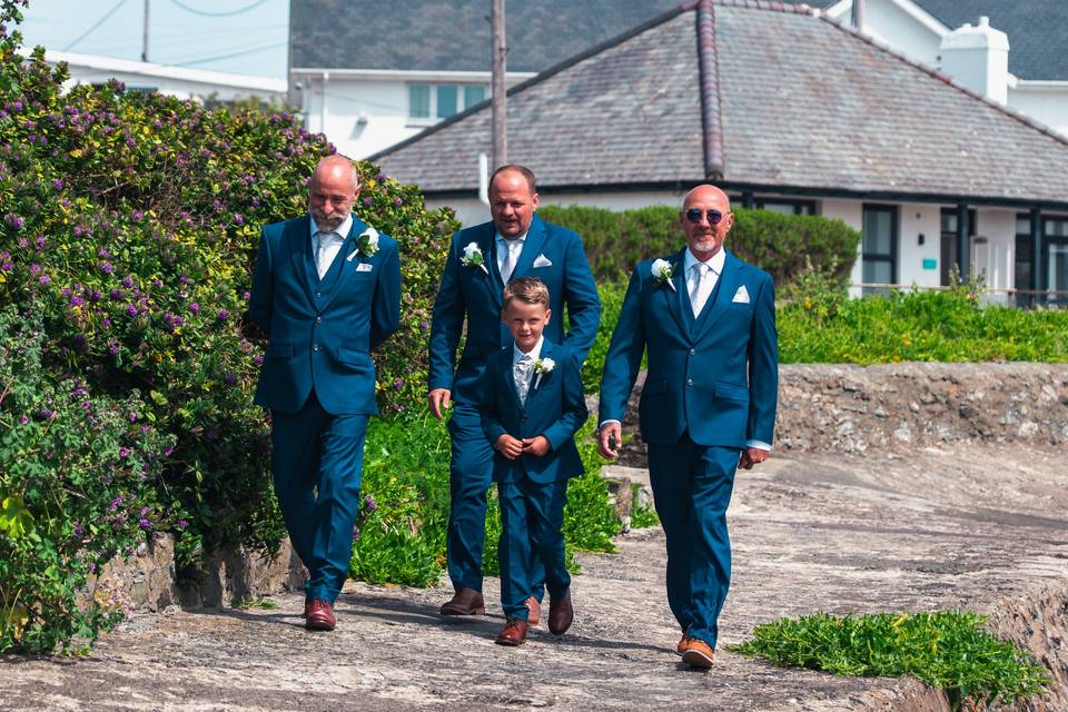 Here come the boys at the wedd