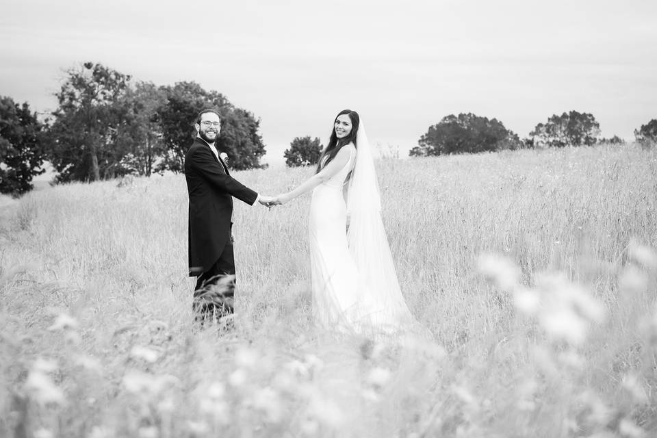 Newlyweds in a field
