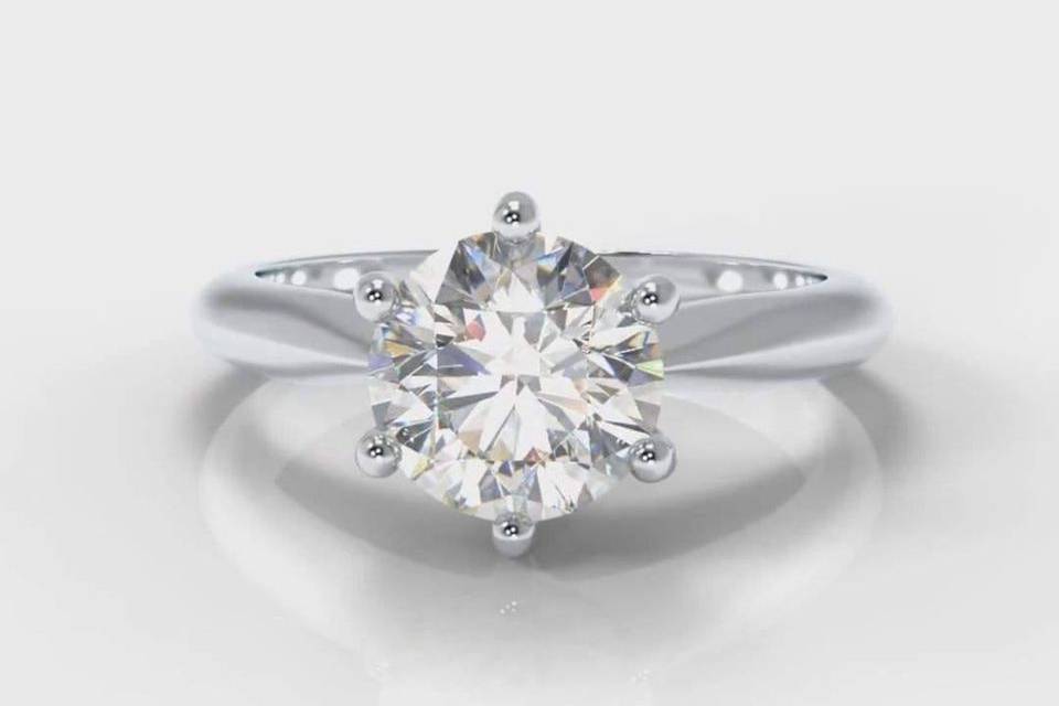 Star solitaire engagement ring