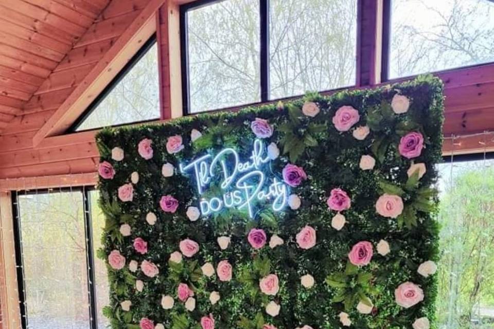 Foliage wall with neon
