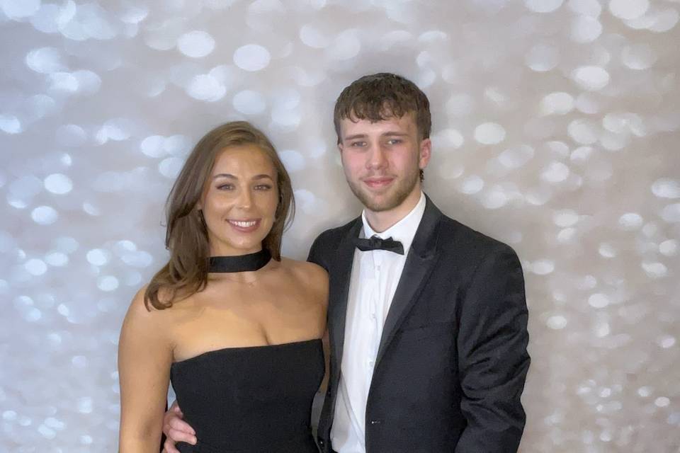 Couple using gold backdrop
