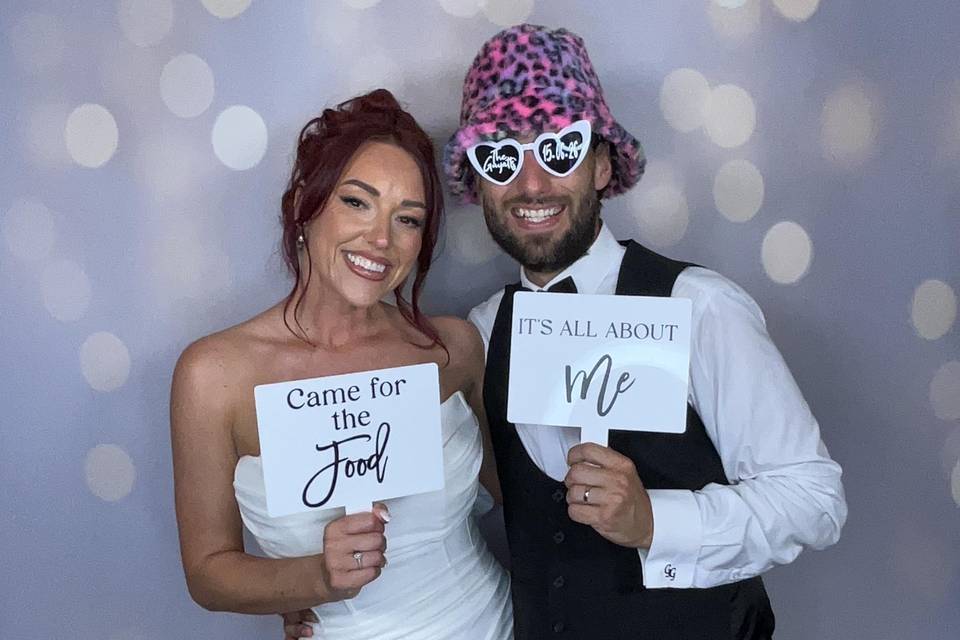 Newly Wed couple using booth