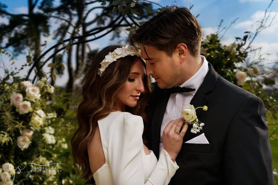 Groom looking at bride