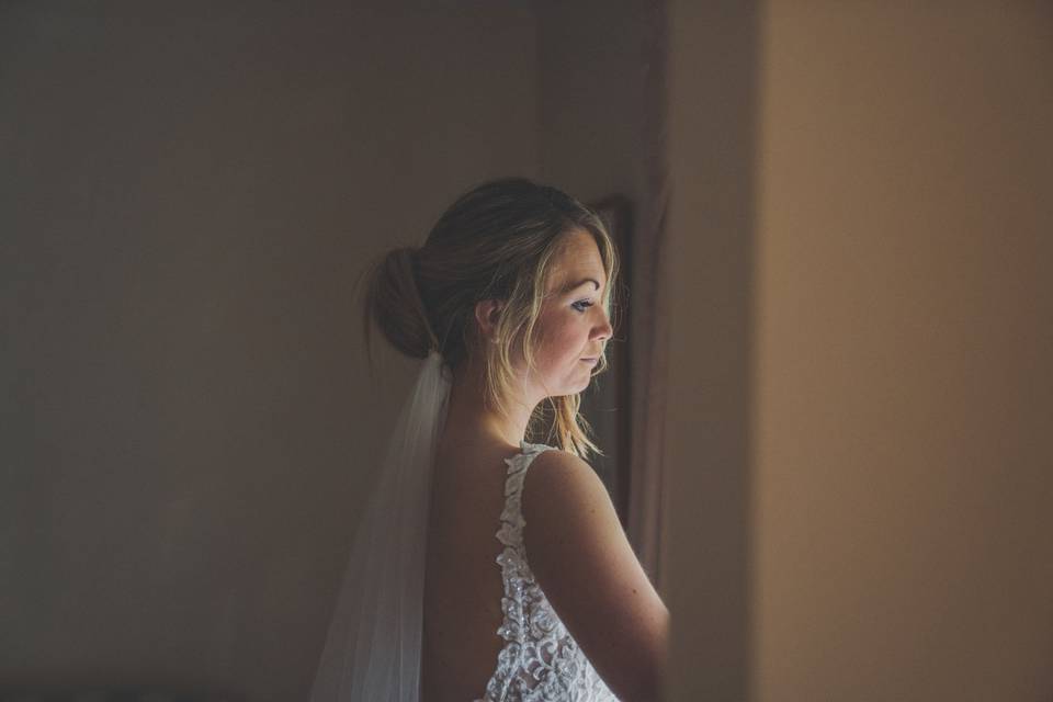 Bride looking out the window