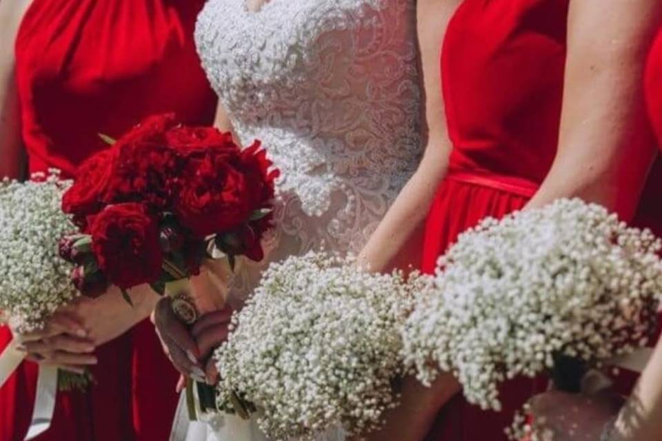 Red peonies and bridesmaid bouquets