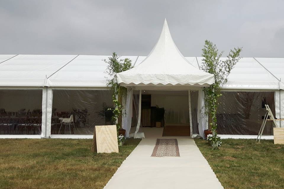 Marquee with retractable sides