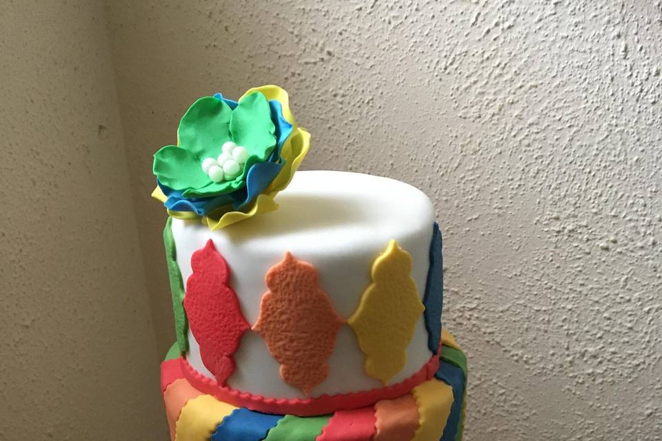 Colourful rainbow wedding cake