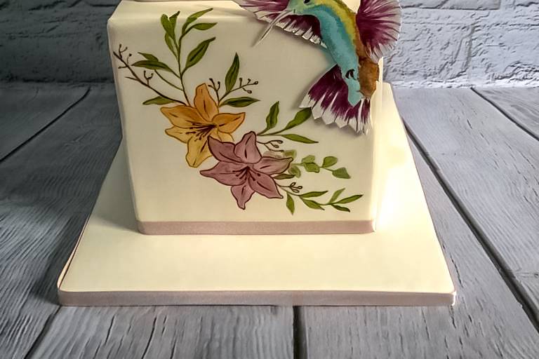 Hummingbird hand-painted cake