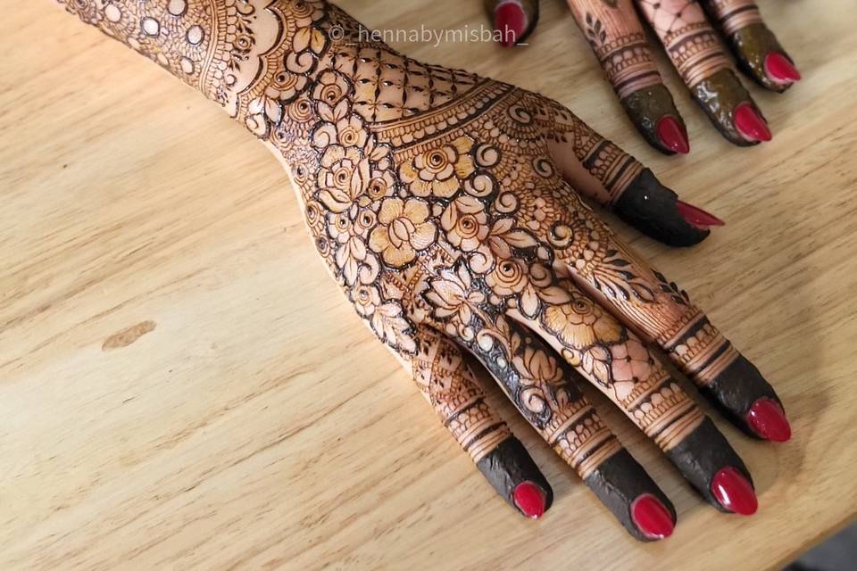 Mid arm length bridal henna