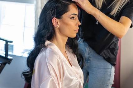 Doing their hair magic