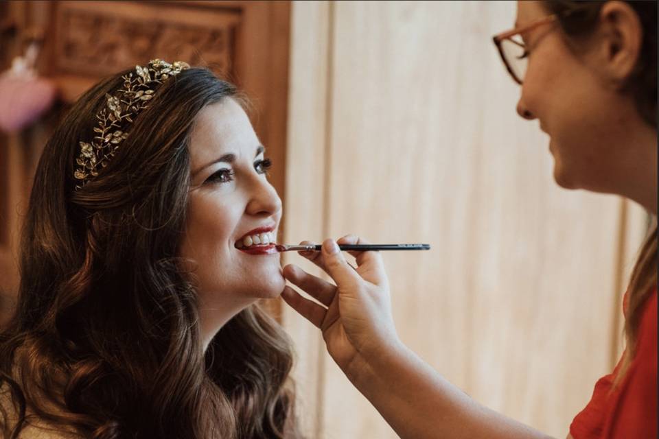 Bride getting makeup done