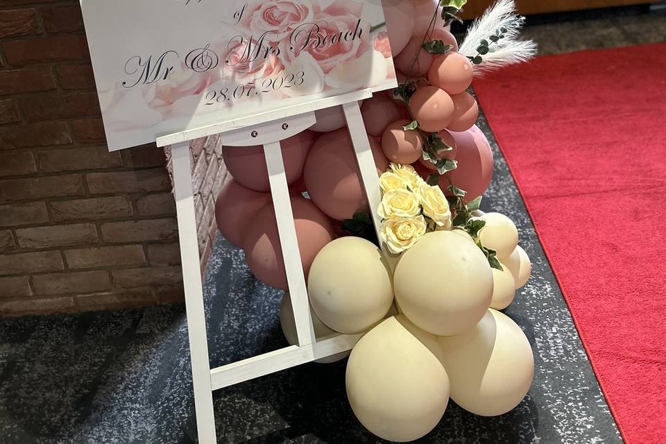 Welcome sign with balloons