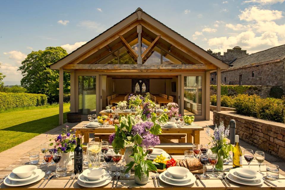 Outdoor dining terrace at Byre
