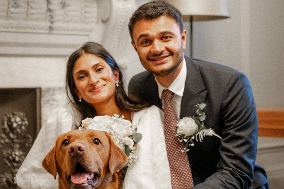 Smiling with their furry friend