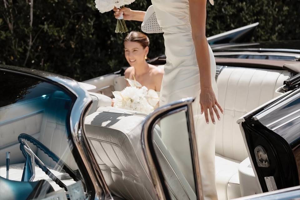 Bridesmaid in car