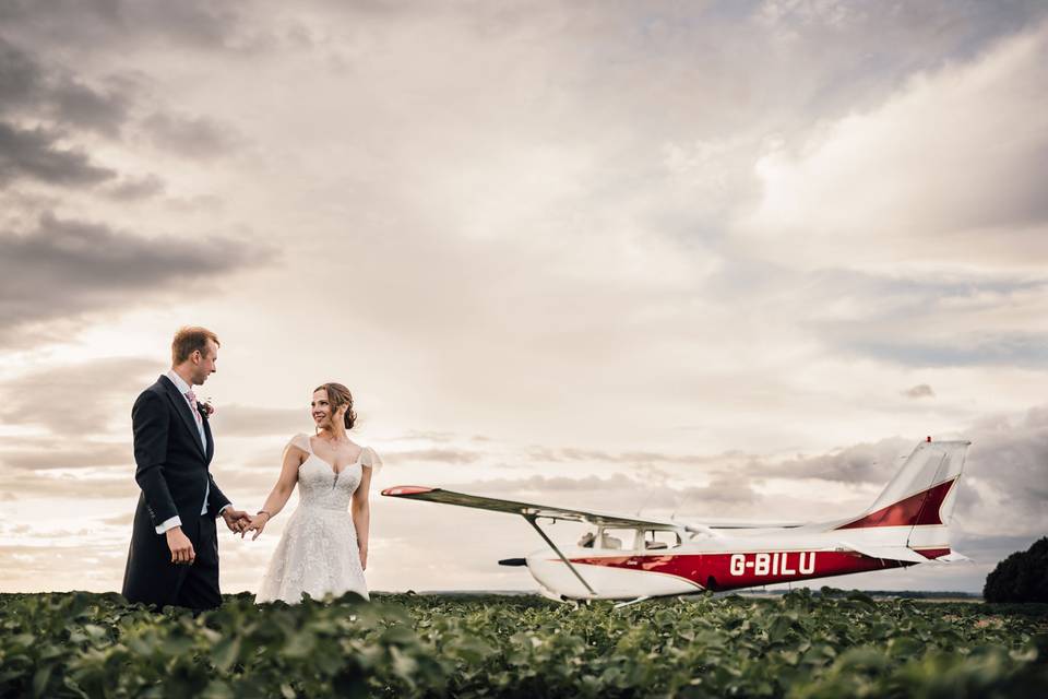 Bride & Groom with plane