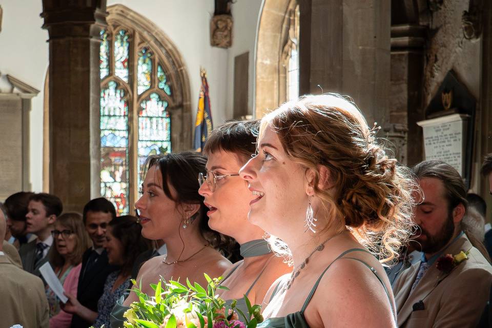 Bridesmaids at church wedding