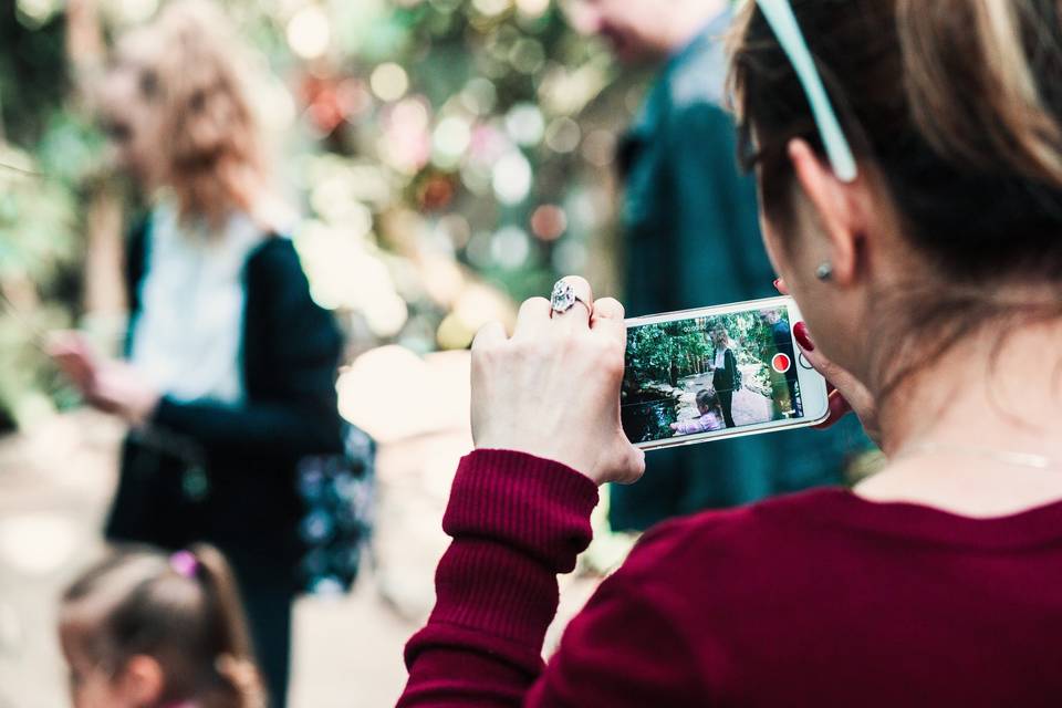 Woman taking an image on her p