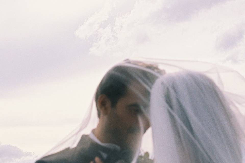 Couple's portrait under veil