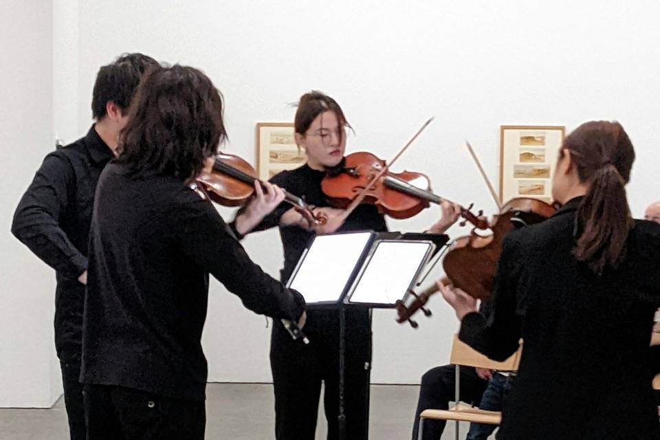 A string group at a gallery