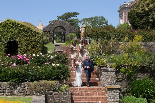 Bride arriving in gardens