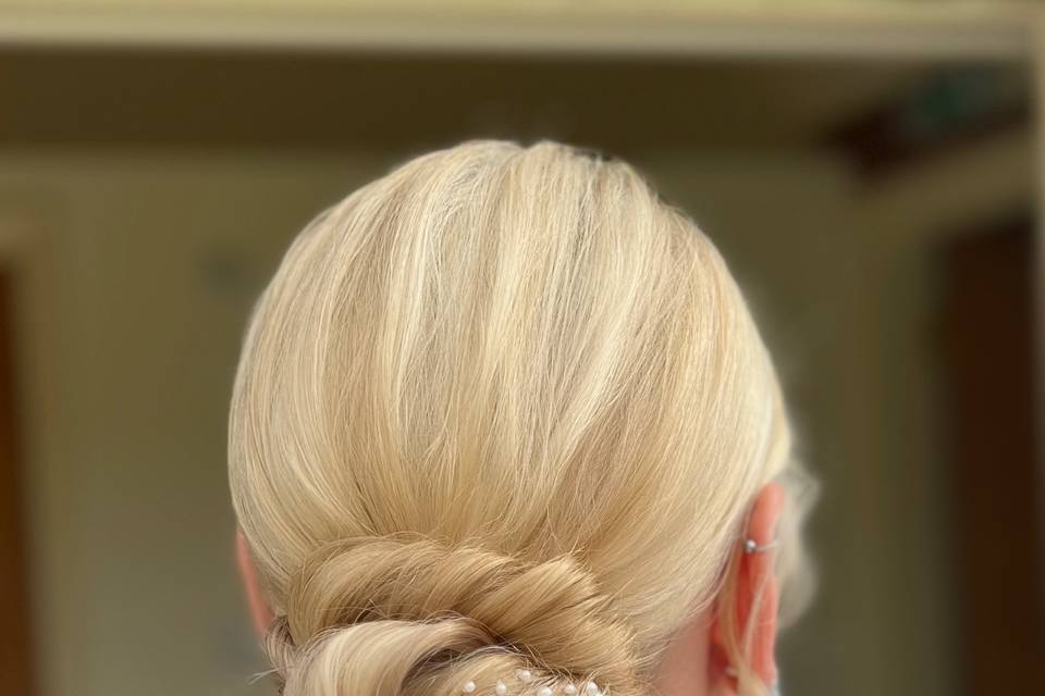 Sleek chic classy low bun