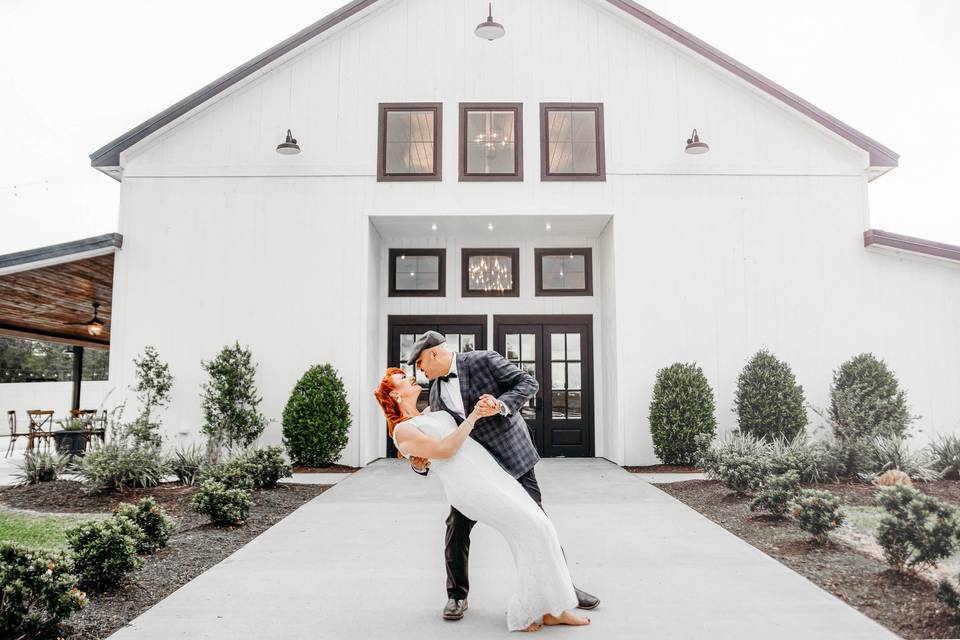 White Barn Bride And Groom
