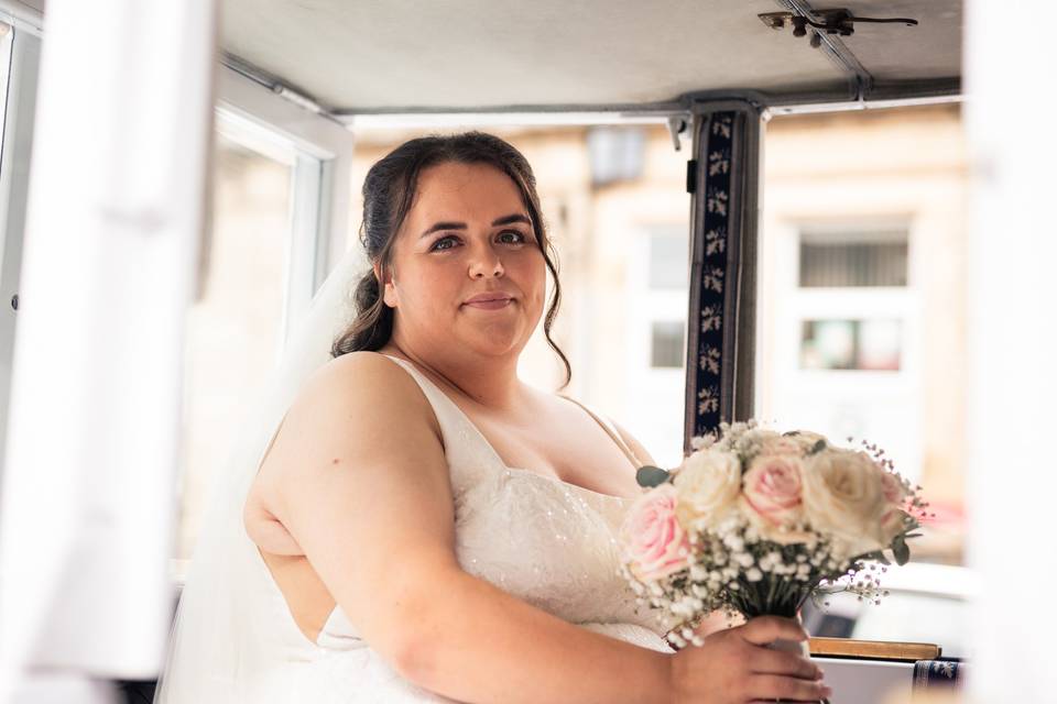 Bride arriving in a carriage