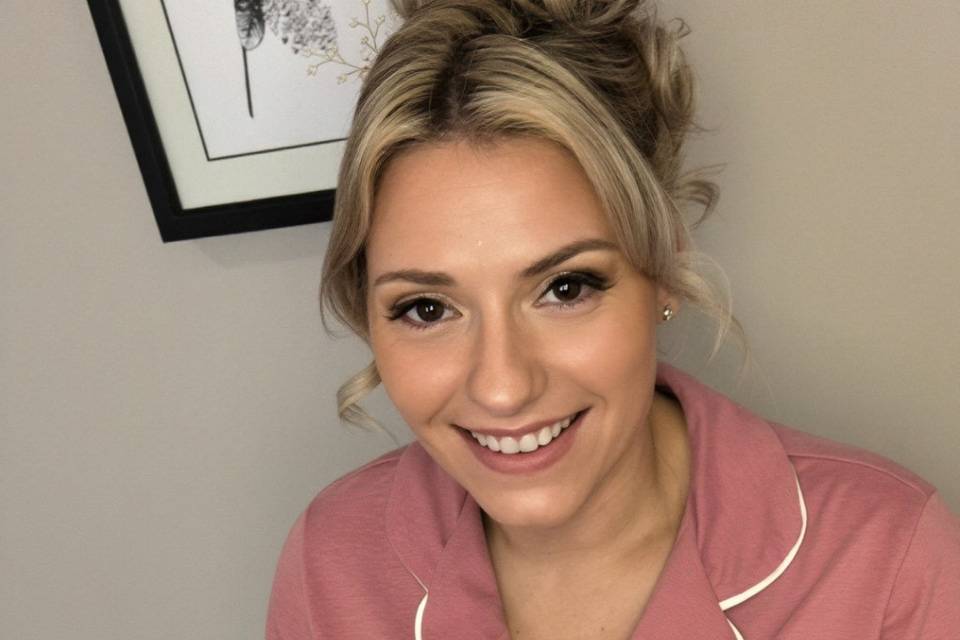 Glam bridesmaid makeup and pin