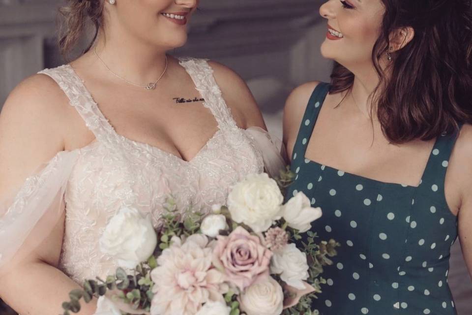 Bride and bridesmaid