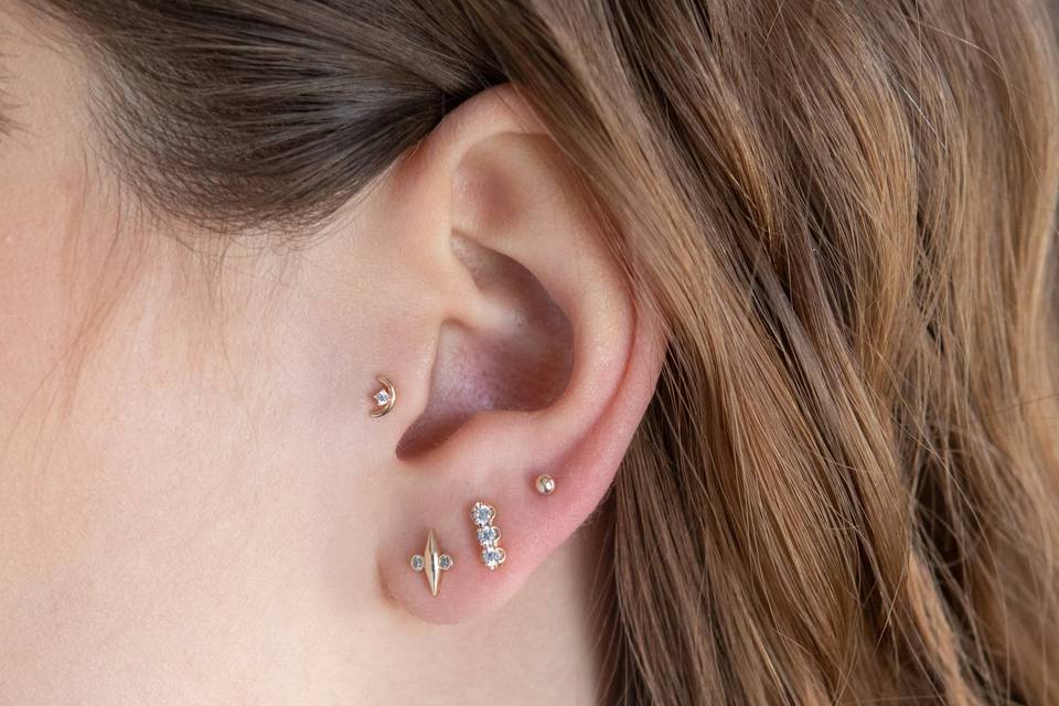 14k gold tragus piercing