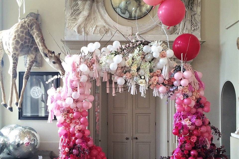 Balloon arch in reds and pinks