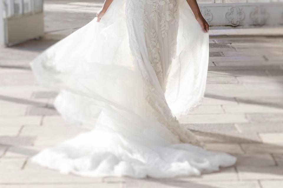 Sleek gowns with overskirts