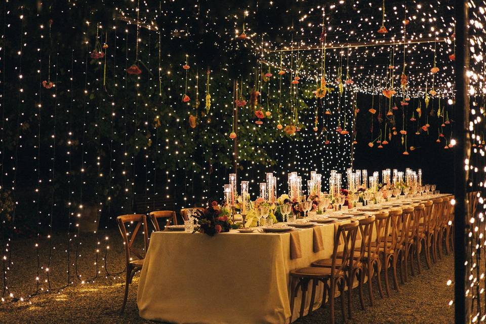 Fairy lights tunnel wedding