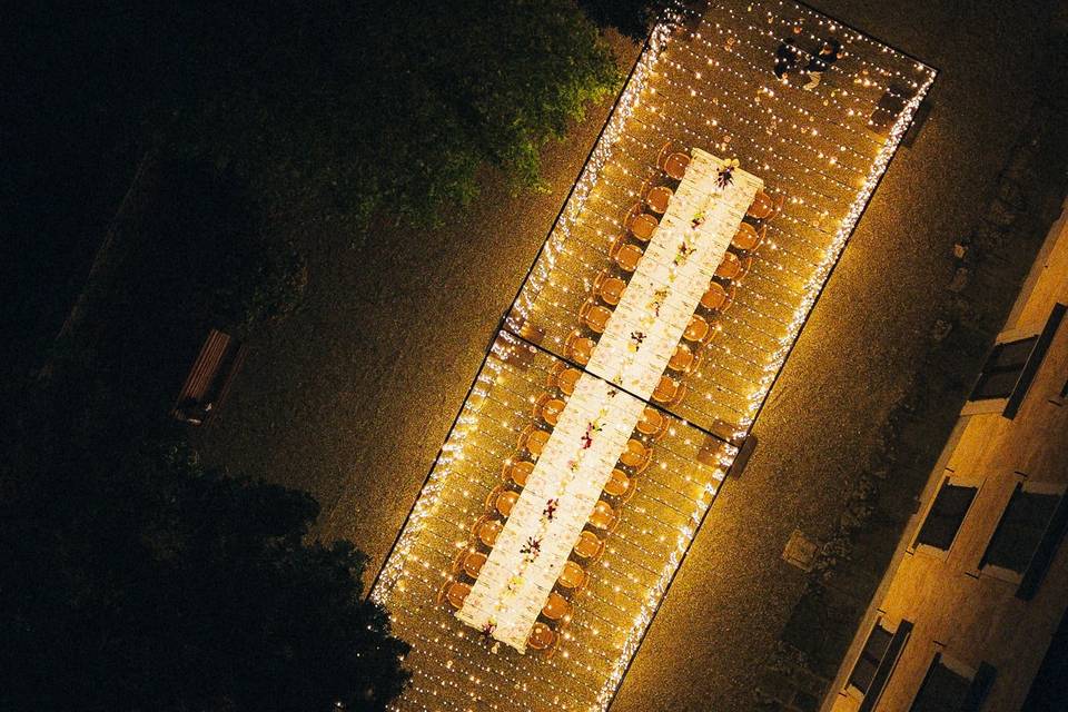 Fairy lights tunnel wedding