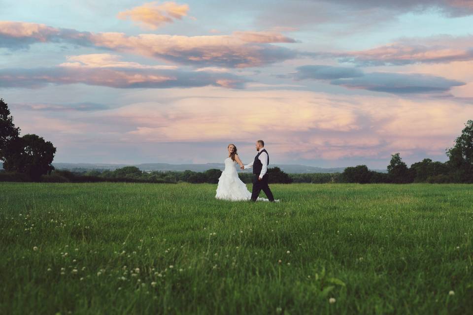 Couple walk at sunset