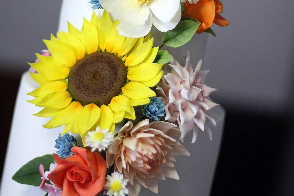 Three-tier bright floral cake.