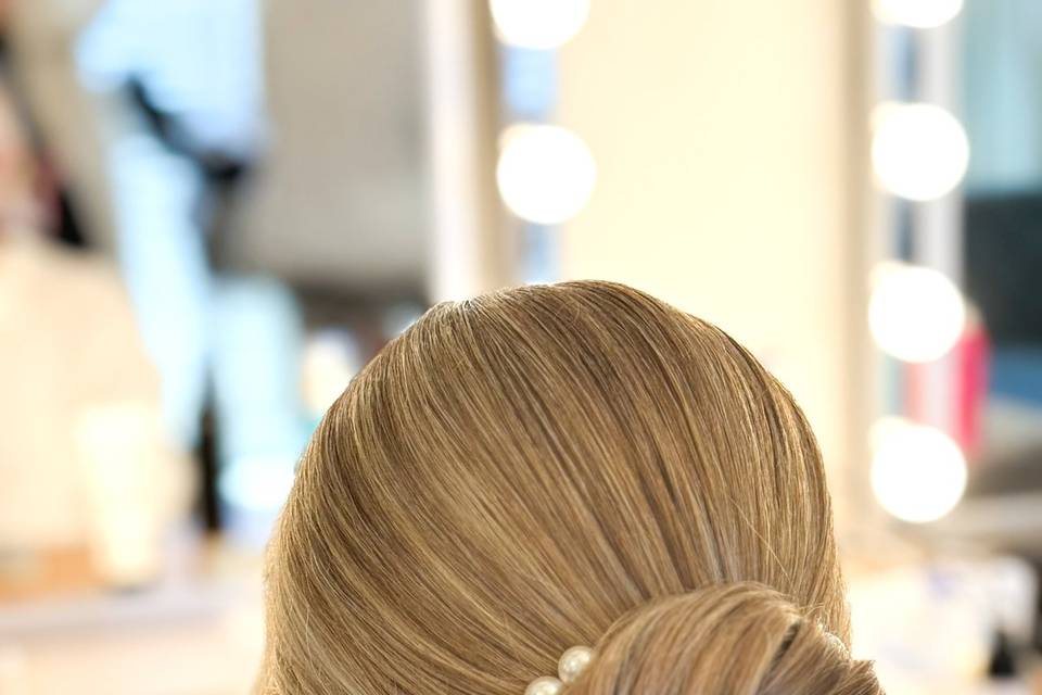 Low sleek bun - thick hair