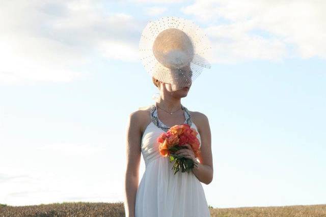 Celestial - Statement headpiece decorated with ivory feathers and Swarovski crystals