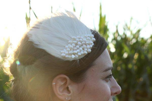 Pearl - Feathered headpiece embellished with freshwater pearls.