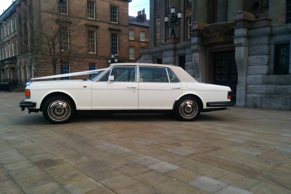 White Rolls Royce wedding car