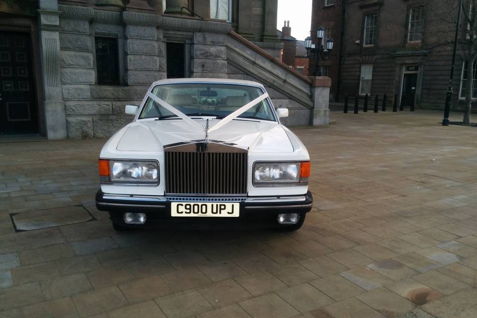 White Rolls Royce wedding car