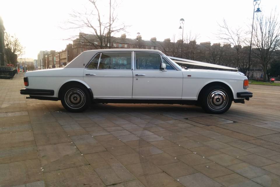 White Rolls Royce wedding car