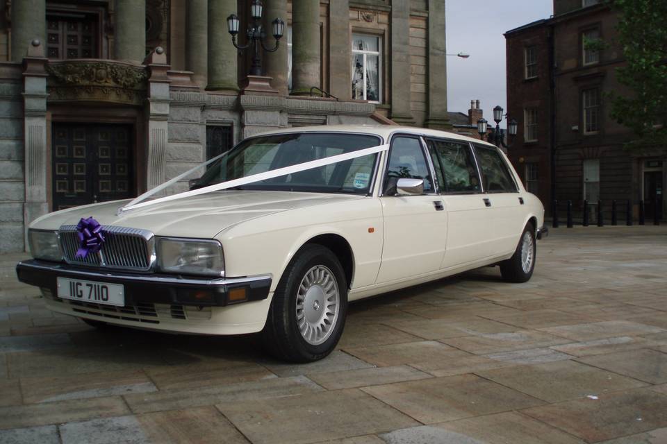 Their white Daimler Limousine