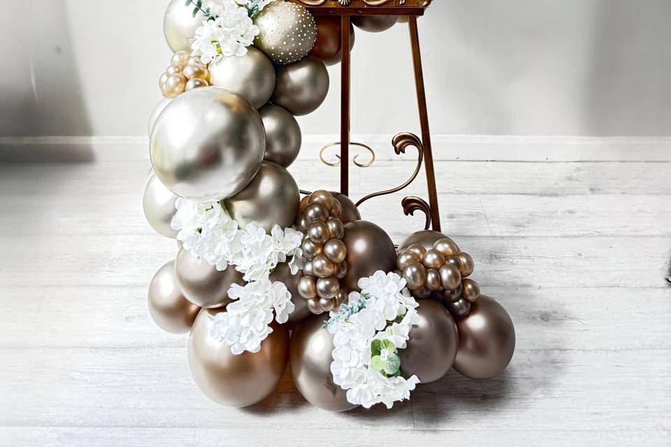 Gold sign with antique easel