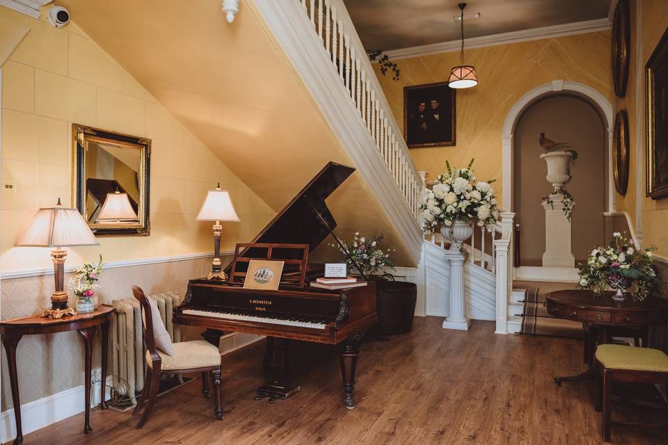 Piano by the stairs