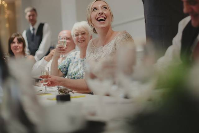 Bride laughs at speeches