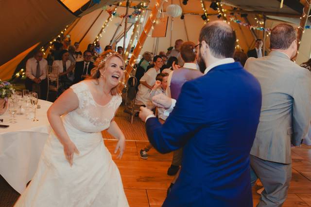 Groom reels bride in