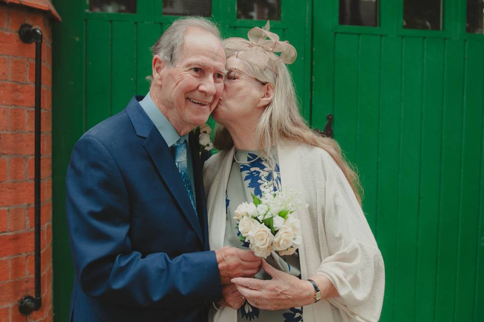 Grandparents share kiss